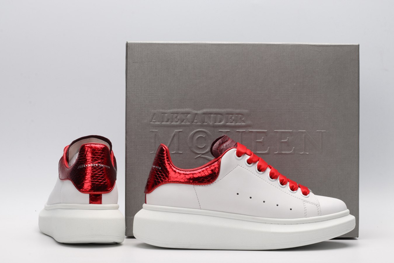 AMQ oversized sneakers with red heel