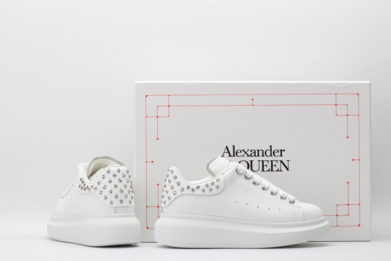 AMQ oversized white sneakers with siL*Ver-finished hammered stud