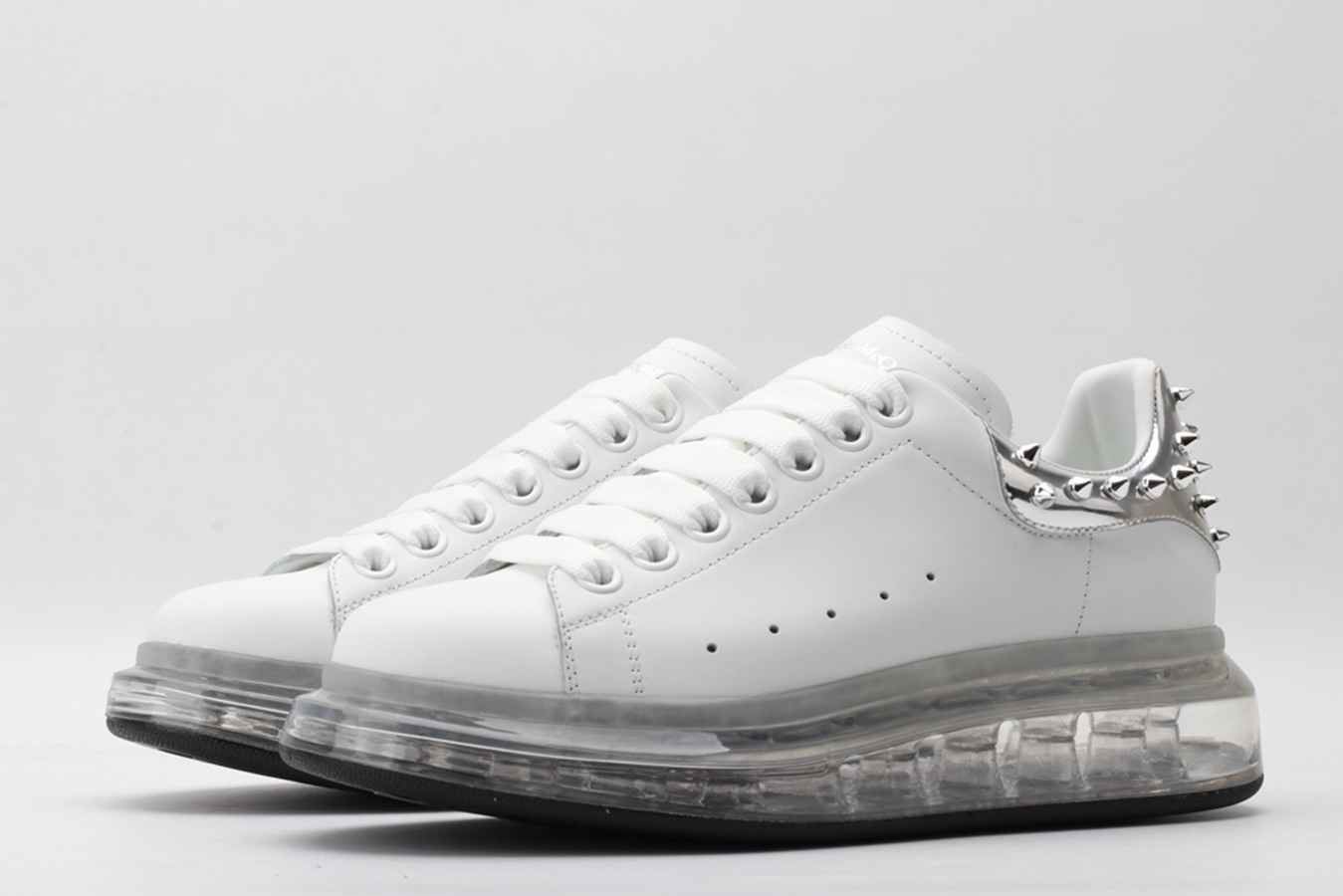 AMQ oversized sneakers with SiL*Ver rivet heel