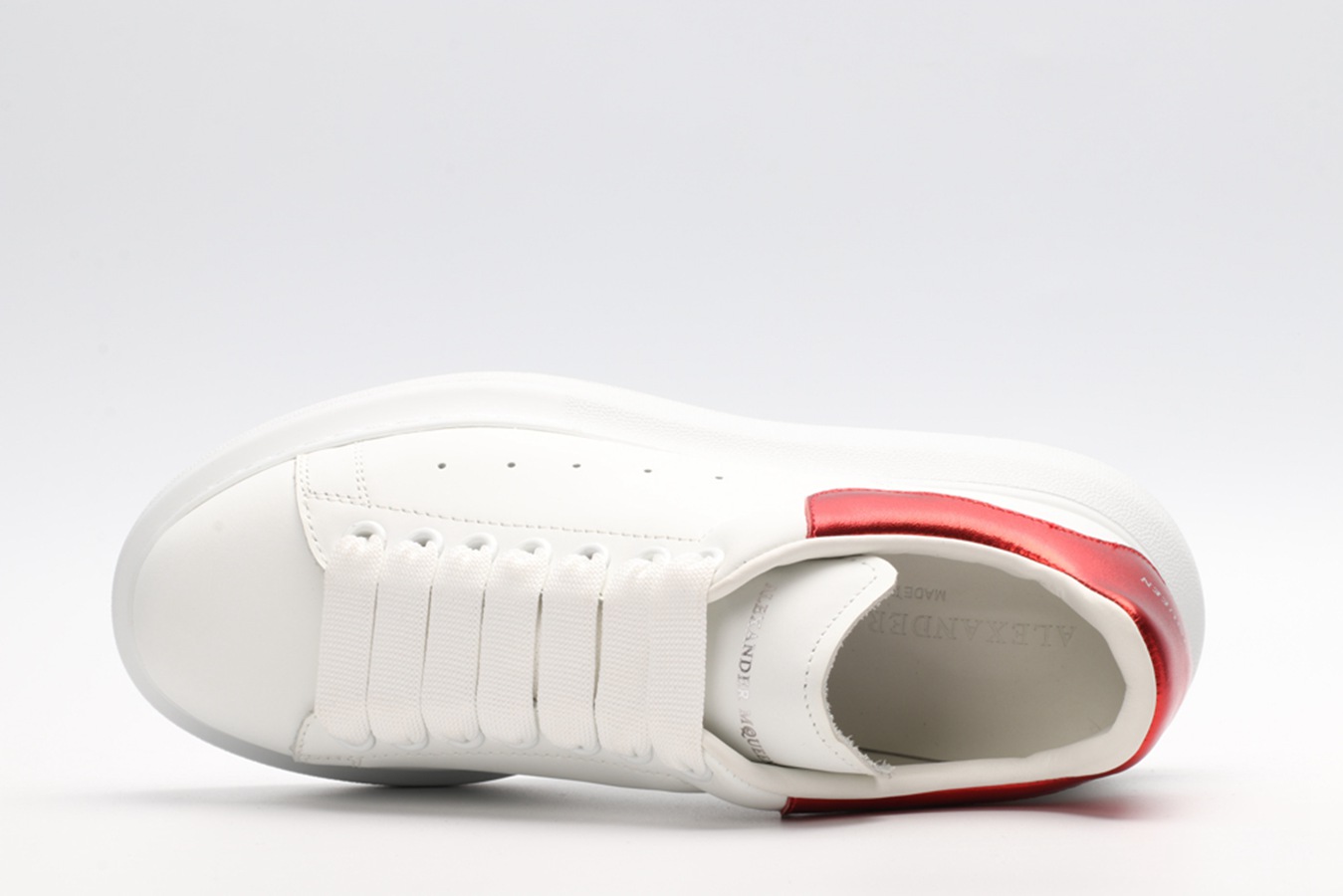 AMQ oversized sneakers with red heel