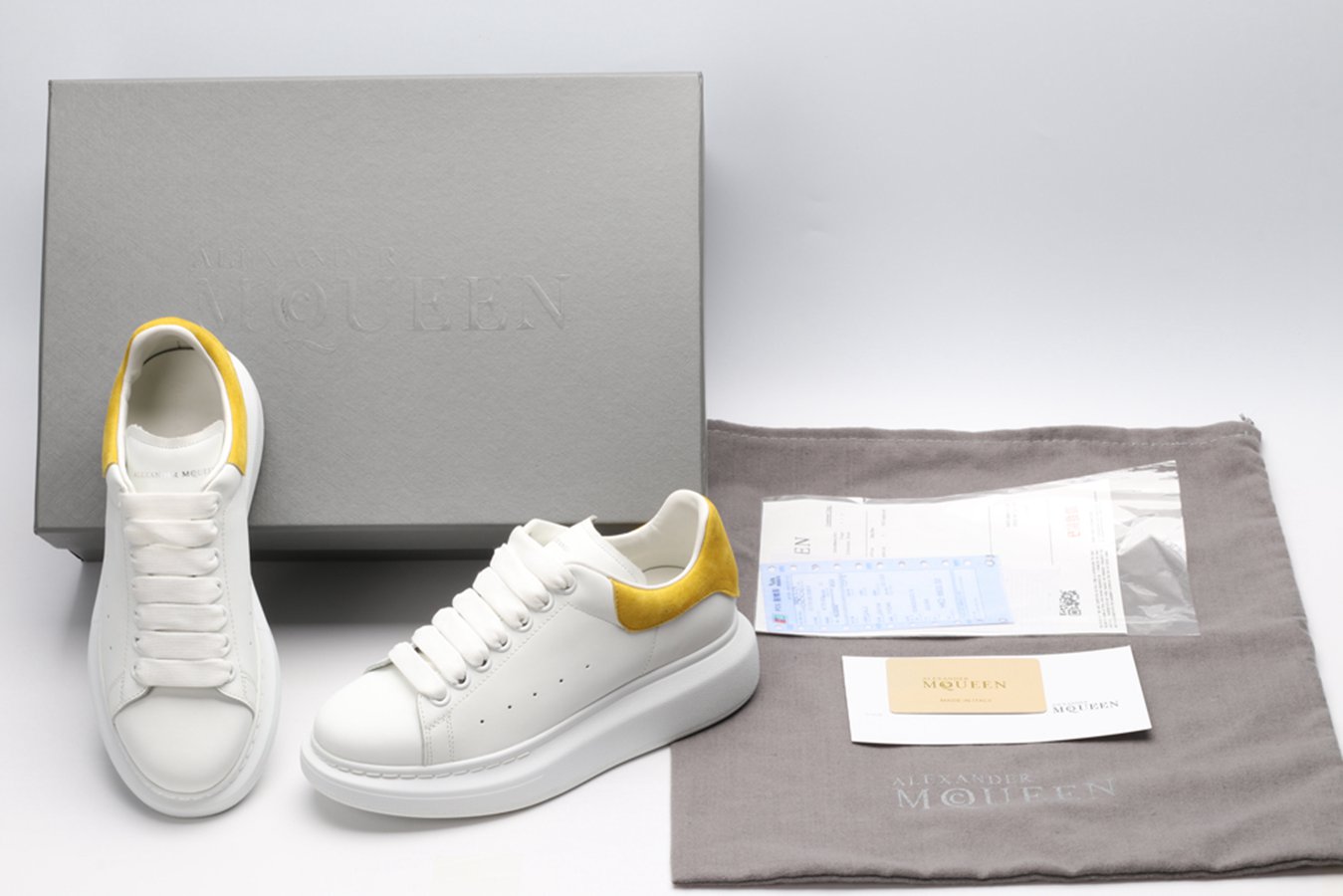 AMQ OVERSIZED SNEAKER Yellow heel